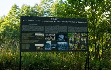 tablica z informacją o cmentarzu wojennym w Romotach